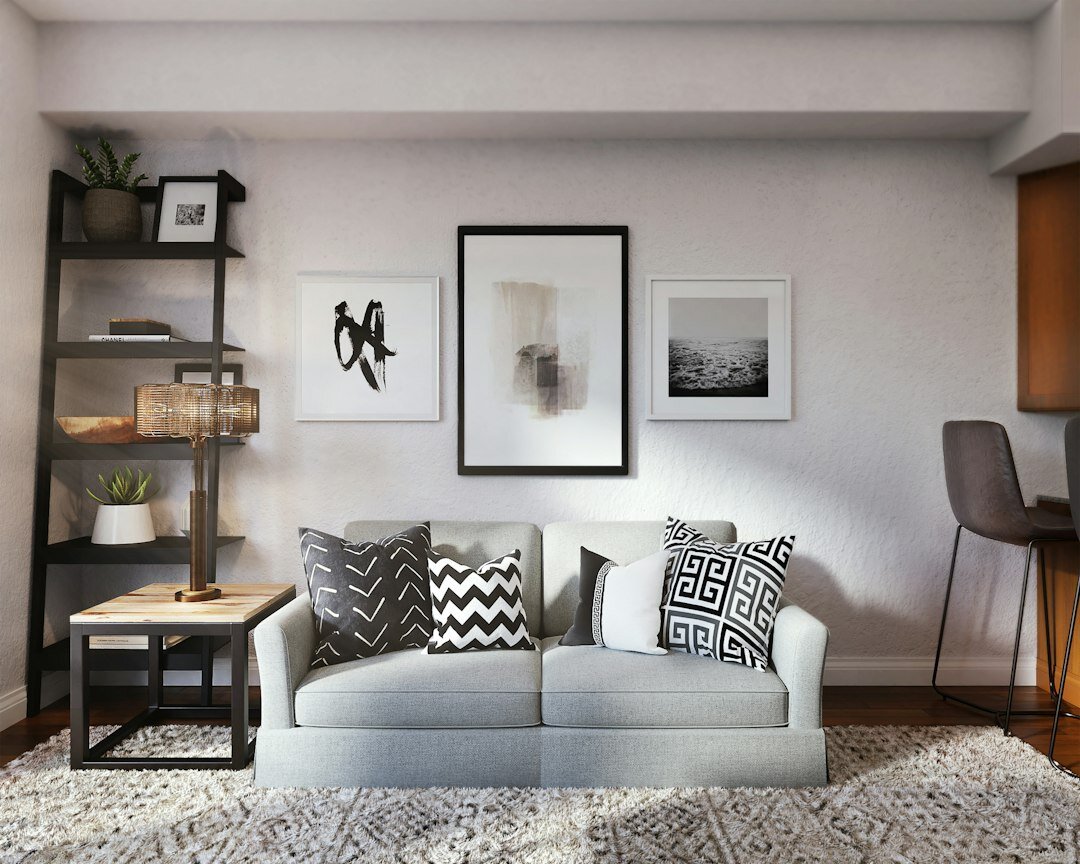 Bright modern living room with curated art and a velvet sofa