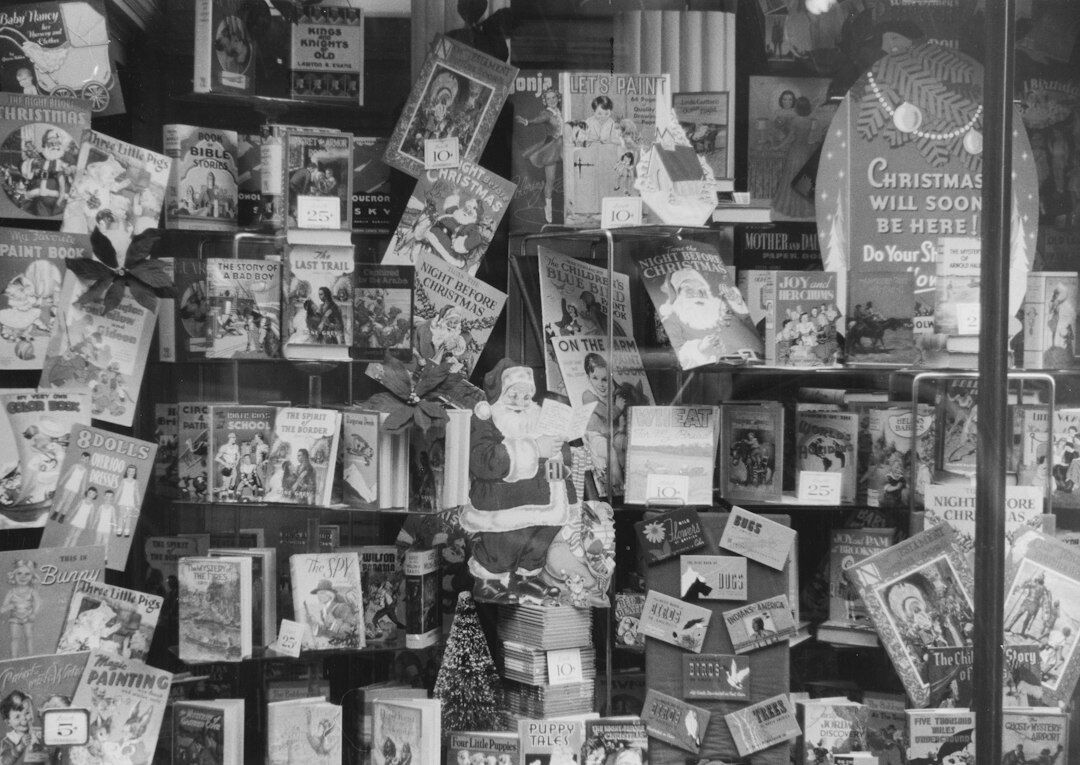 Vintage magazine archive shelves filled with old glossy magazines and photographs