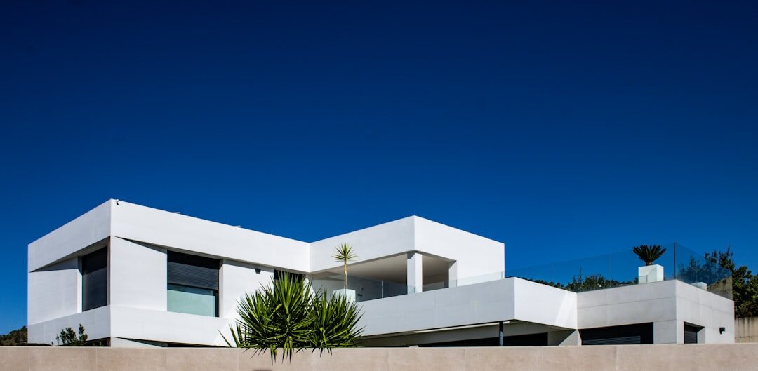 Modern minimalist villa with a glass facade and clean architectural lines